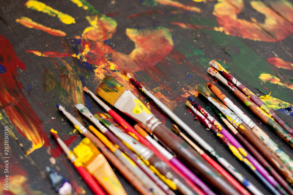 Fototapeta premium Artist paint brushes background.