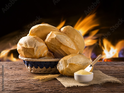 Murais de parede Basket of French bread, traditional Brazilian bread with fire background