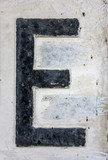 Written Wording in Distressed State Typography Found Letter E