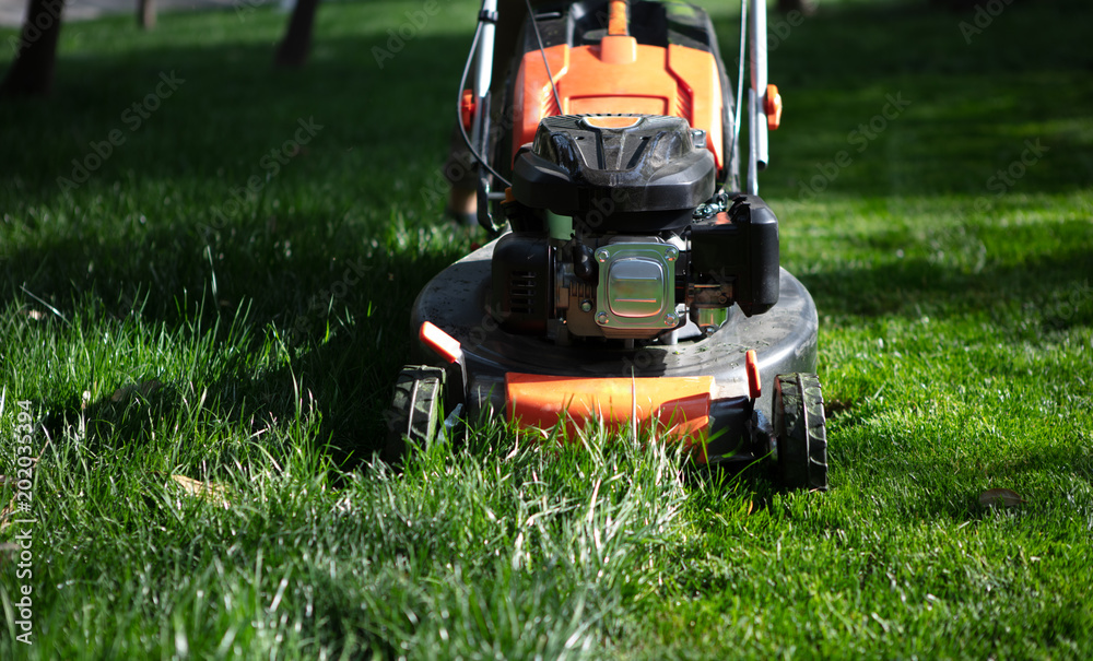 Detail of a lawn-mower outdoor Detail of a lawn-mower outdoor