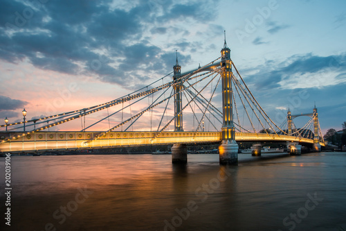 Albert Bridge and beautiful sunset over the Thames, London, England UK © panifuzja