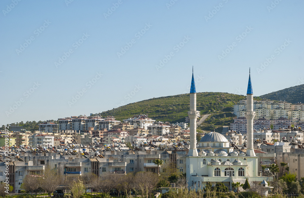 Milas, provinces of Mugla, Turkey -March 18, 2014:View of the mosque with minarets in the city of  Milas,Mugla provinces.