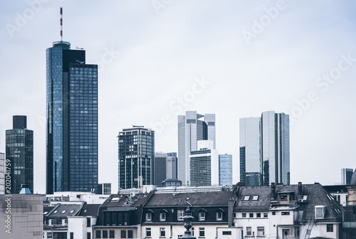 Frankfurt am Main skyline behind older residential buildings