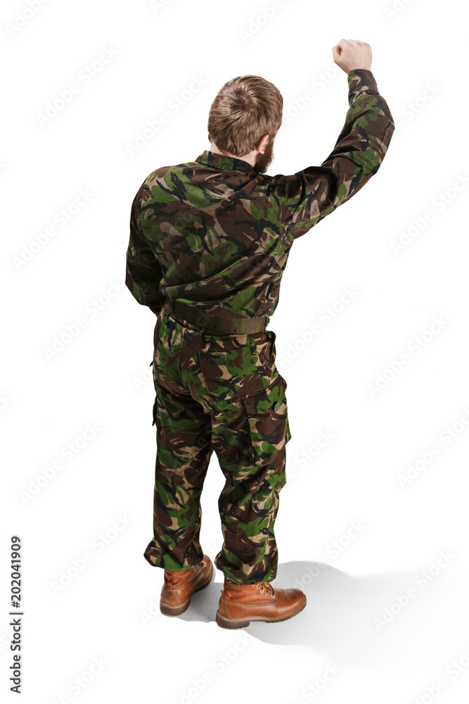 Young army soldier wearing camouflage uniform isolated on white Young army soldier wearing camouflage uniform isolated on white