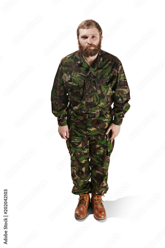 Young army soldier wearing camouflage uniform isolated on white Young army soldier wearing camouflage uniform isolated on white