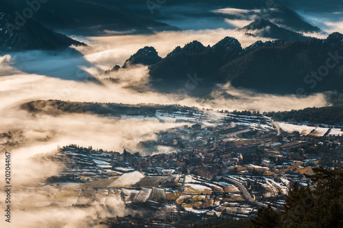 village in the valley coming out of the fog © Raul Mellado