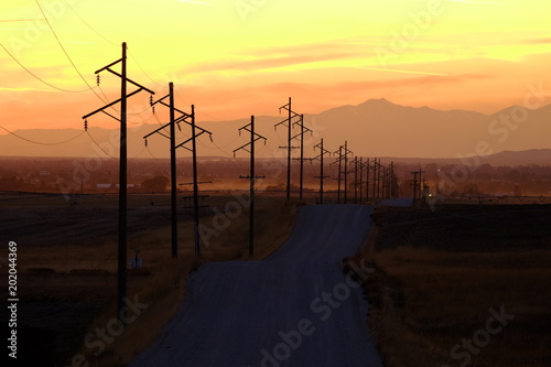 Sihouette Silhouetted Power Lines at Sunrise or Sunset