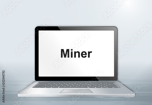 Laptop auf Holztisch - Miner