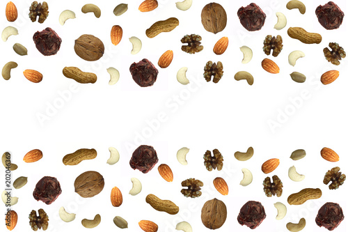 Various dry fruit nuts and chocolate abstract pattern with free blank space Almonds chocolate peanuts cashew walnut