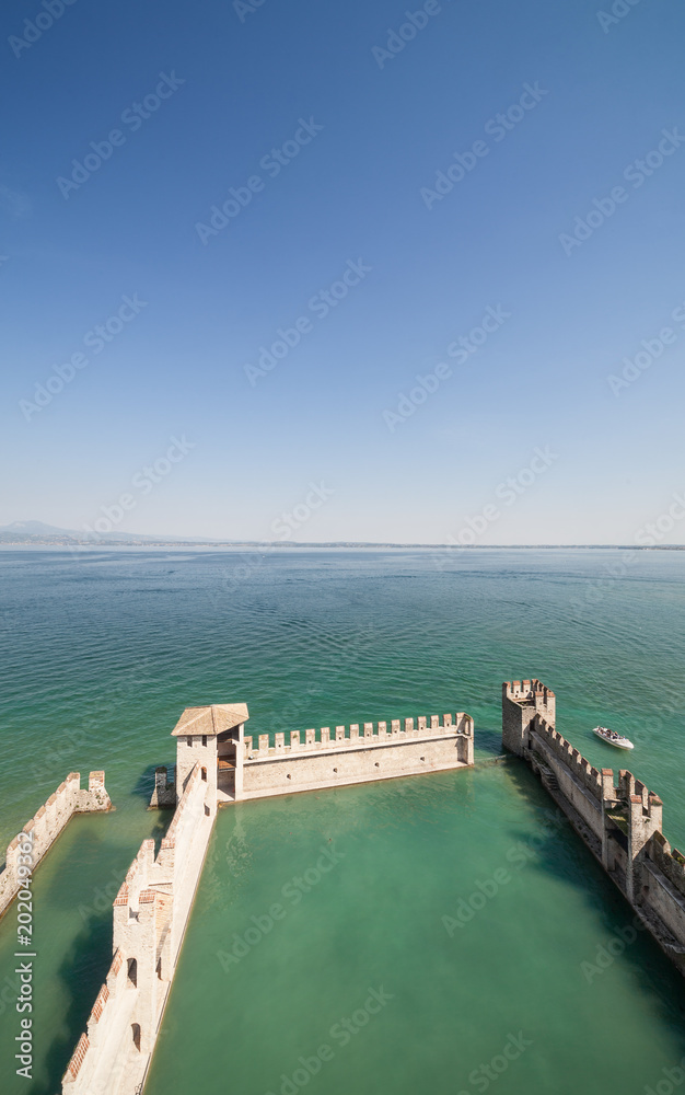 Aerial view of Scaliger Castle in Sirmione. Garda Lake - Italy .