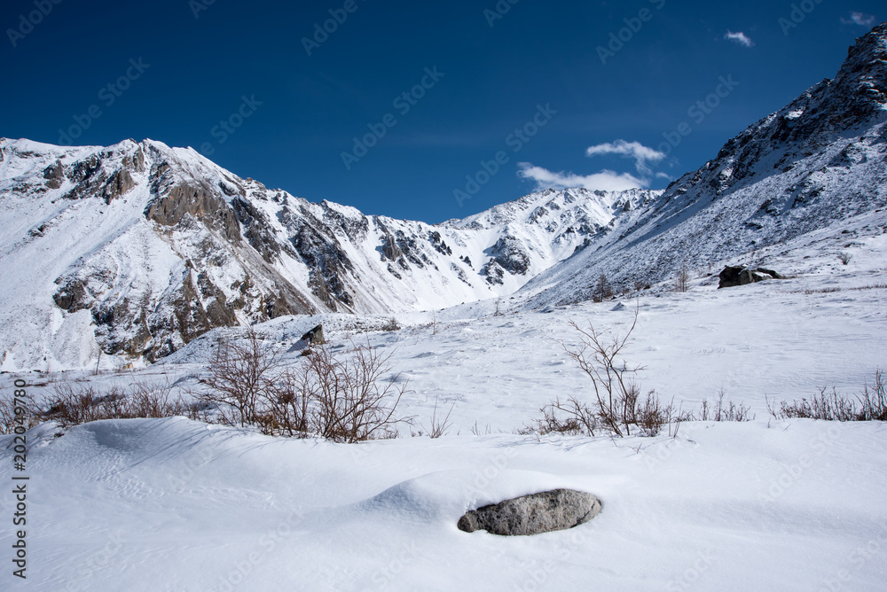 High mountains under snow in the winter High mountains under snow in the winter