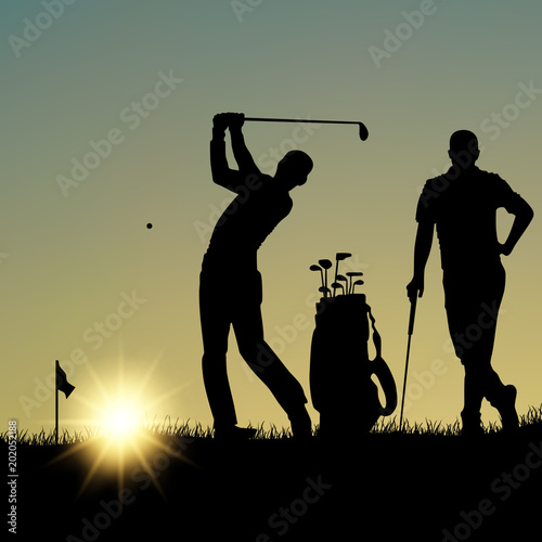 Two golfers silhouette playing on the playground at sunset