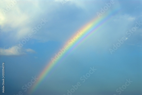 Rainbow on blue sky © Yury Kirillov