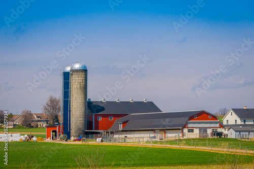 Outdoor view of huge structures located in farm barn field agriculture in Lancaster photo