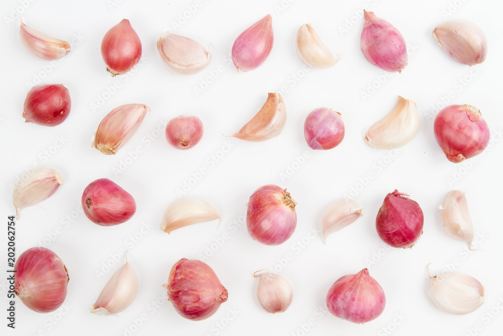 Fresh garlic and red onion isolated white background
