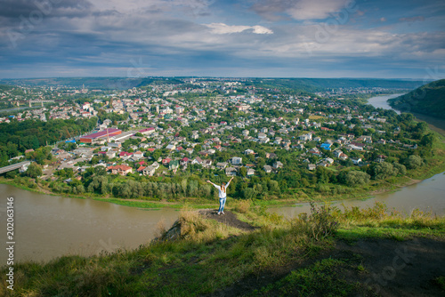 the loop of the river. river Dniester, village Zaleschiki, Ukraine. Peninsula. Tourism in Ukraine. Girl tourist travels around the country. Independent travel around Europe. Zaleshchiki. 
 photo