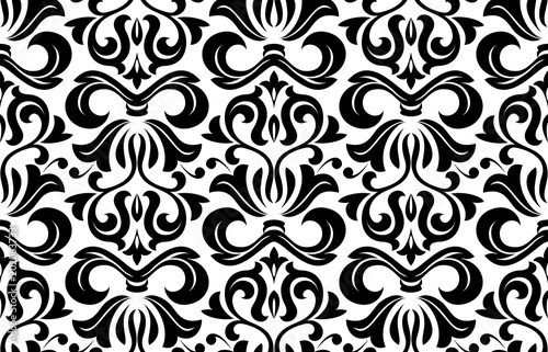 Wallpaper in the style of Baroque. A seamless vector background. White and black floral ornament. Graphic vector pattern