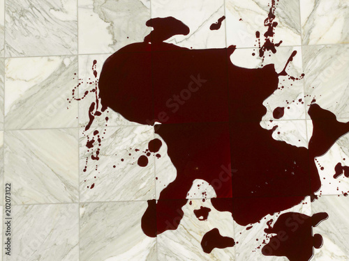 Fake red blood on marble floor
