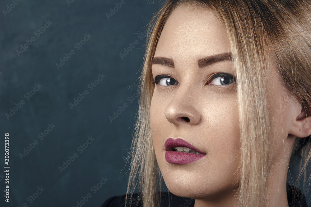 Young beautiful woman blonde curly hairstyle skin care concept portrait. Young beautiful woman blonde curly hairstyle skin care concept portrait.