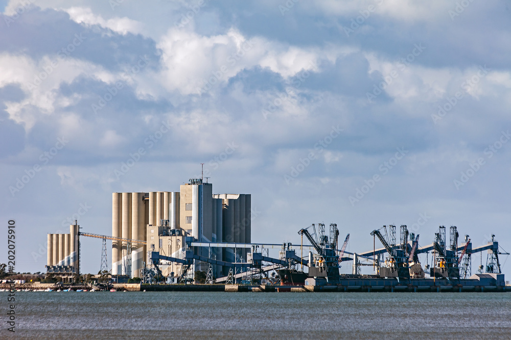 Deep water port for ships transporting grain with large silos and ...