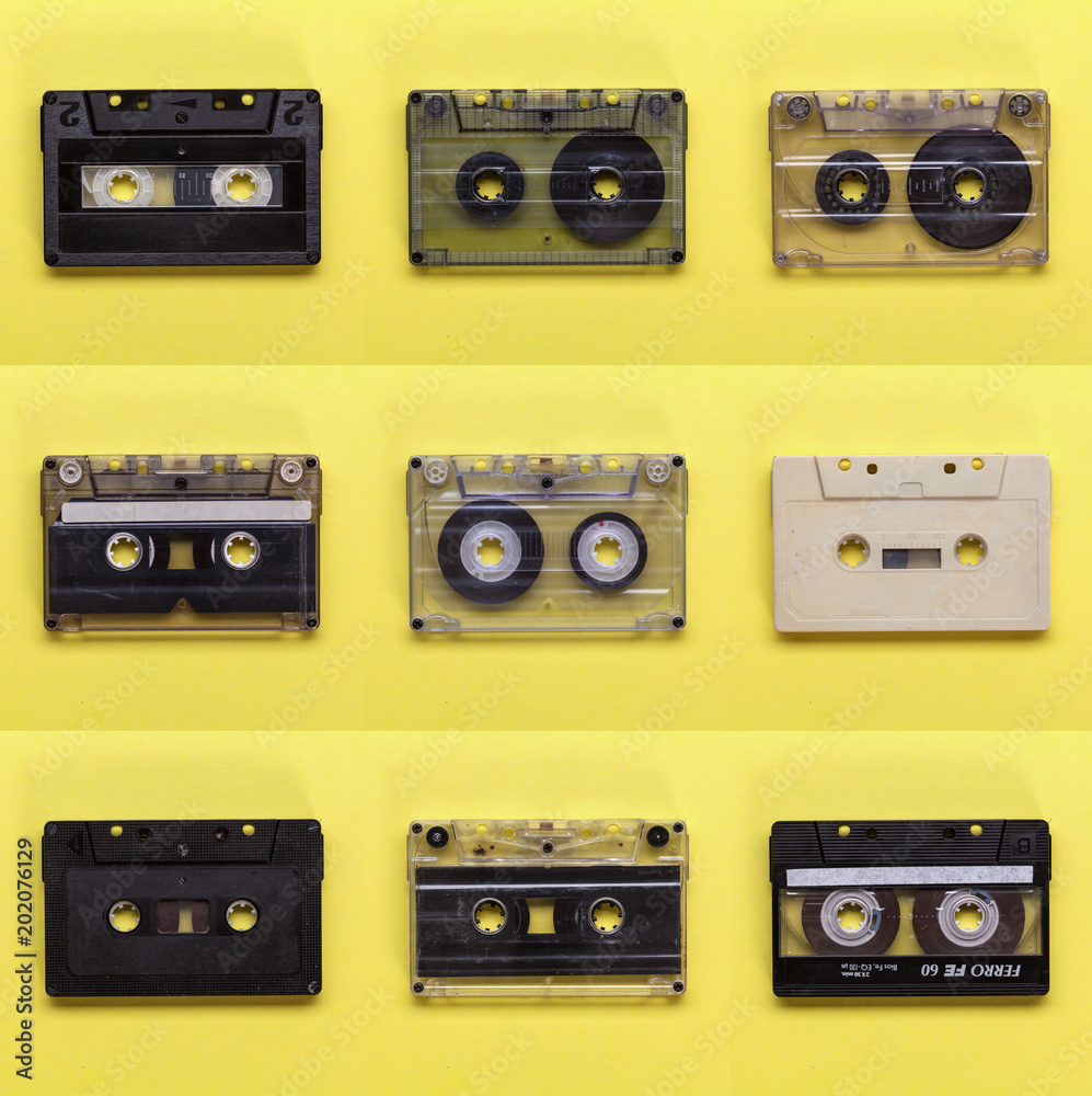 Fototapeta premium Retro music cassette tapes on yellow background