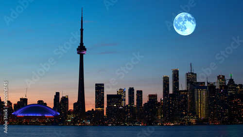 Photography Full moon rising over Toronto in Canada