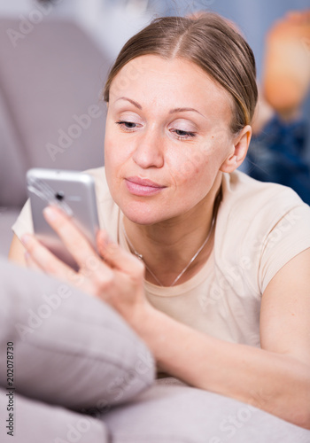 Upset woman with phone