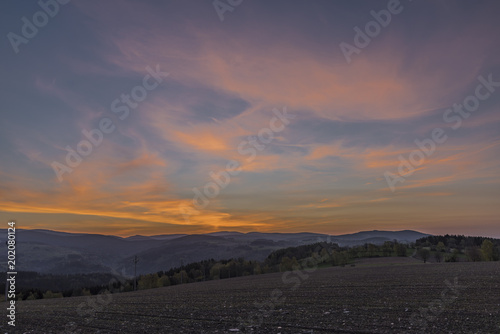 Canvas-taulu Sunrise with Krkonose mountains near Roprachtice village