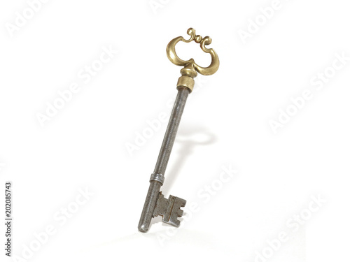 Skeleton key on white background photo