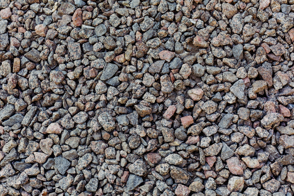 Pattern of different size stones, granite, gravel stones Pattern of different size stones, granite, gravel stones