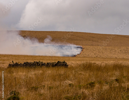 Fotografie Rapidly advancing moorland grass fire on moors near Belmont, Chorley, Lancashire