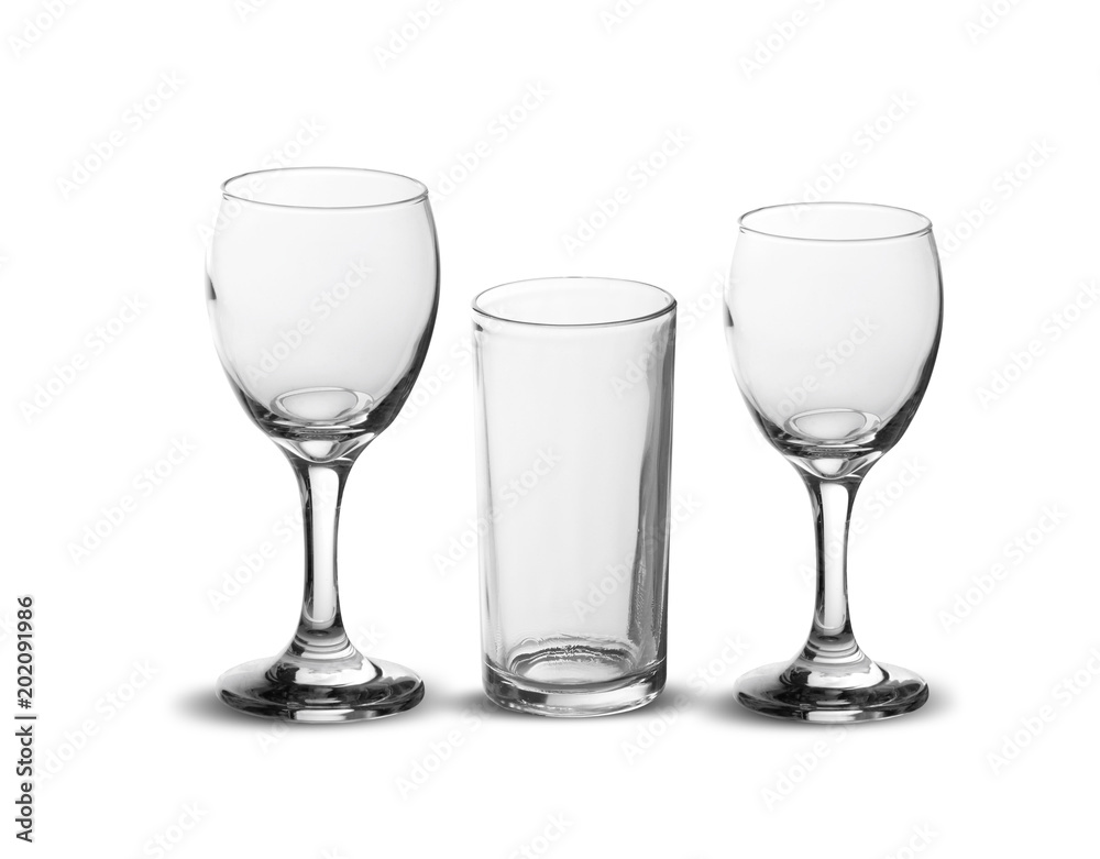 Empty three glasses for water, juice and wine, isolated on white background