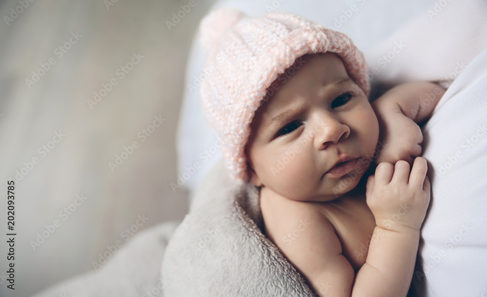 Closeup of face of baby girl looking at camera Closeup of face of baby girl looking at camera