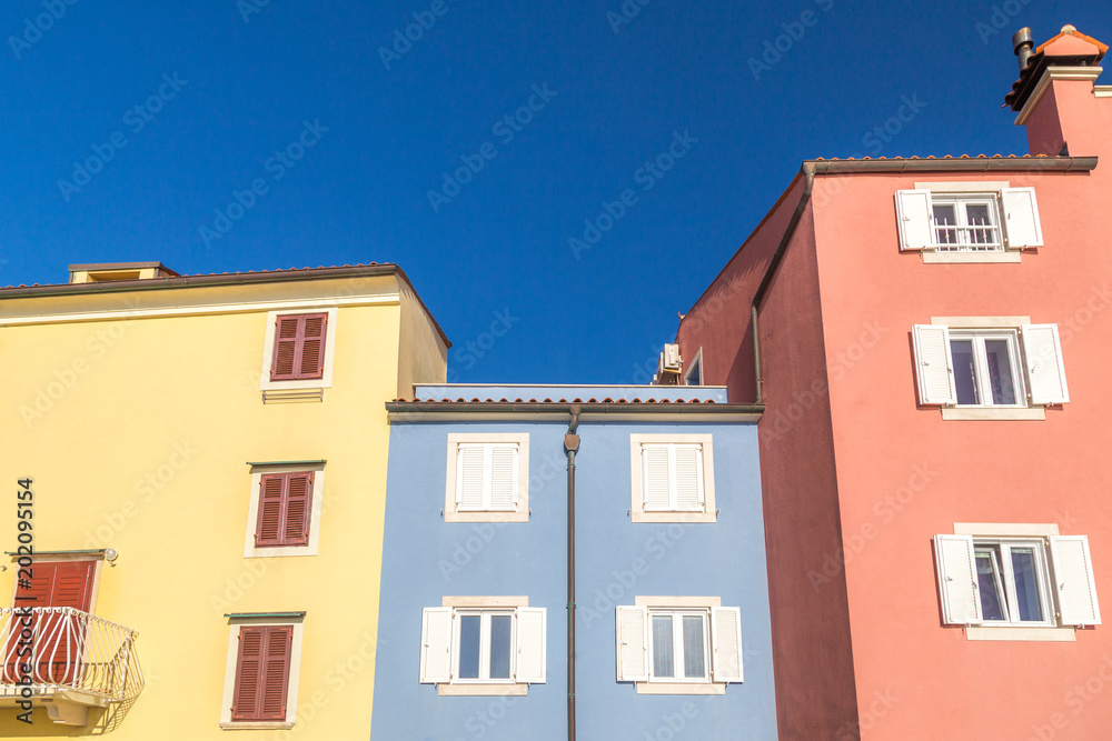 Colorful facade of buildings in Piran town on Adriatic sea, one of major tourist attractions in Slovenia, Europe.