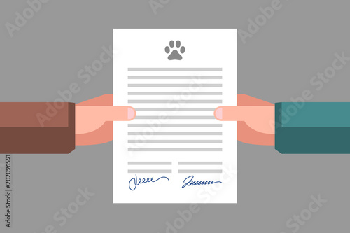 Signing of pet adoption or sale agreement