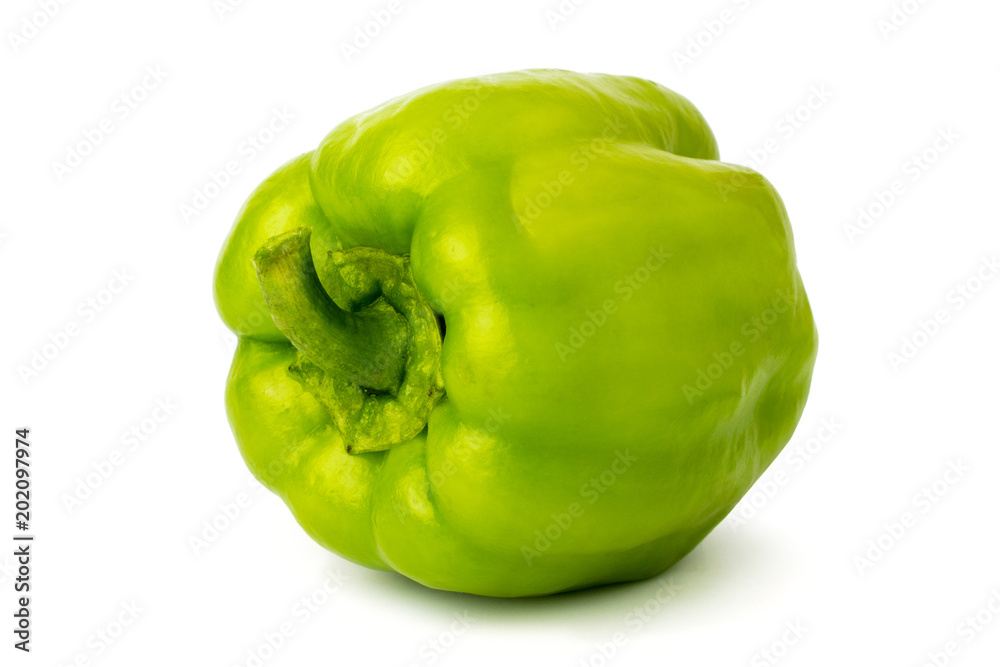 Green bell peppers on a white, close up.