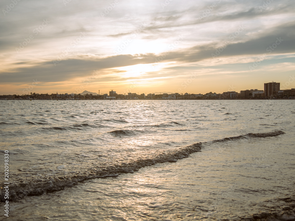 Naklejka premium the Mar Menor at sunset with some beautiful clouds