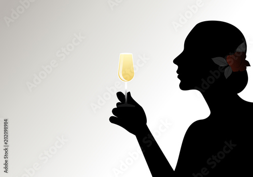 Silhouette of woman, with flower in her hair, holding a glass of white wine. Isolated against backlight on light background.