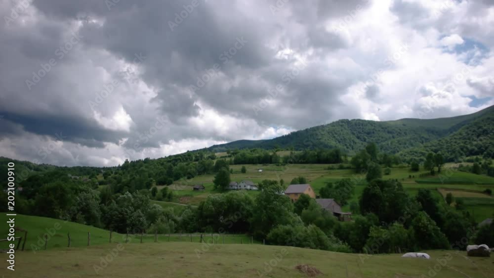 Passing Clouds Cast Shadows On Snow Capped carpathian mountains time lapse Passing Clouds Cast Shadows On Snow Capped carpathian mountains time lapse