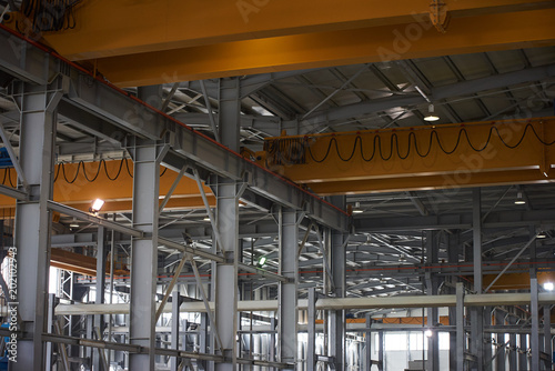 Large Warehouse interior inside a Factory building. Industry manufacturing concept