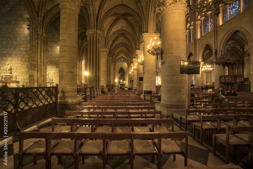 Paris, France- circa May, 2017: Interior view of Notre-Dame Cathedral, one of finest examples of French Gothic architecture in Paris. Construction began in the year 1163 and was completed in the 1345