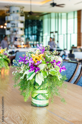 flowers in vase on dinning table