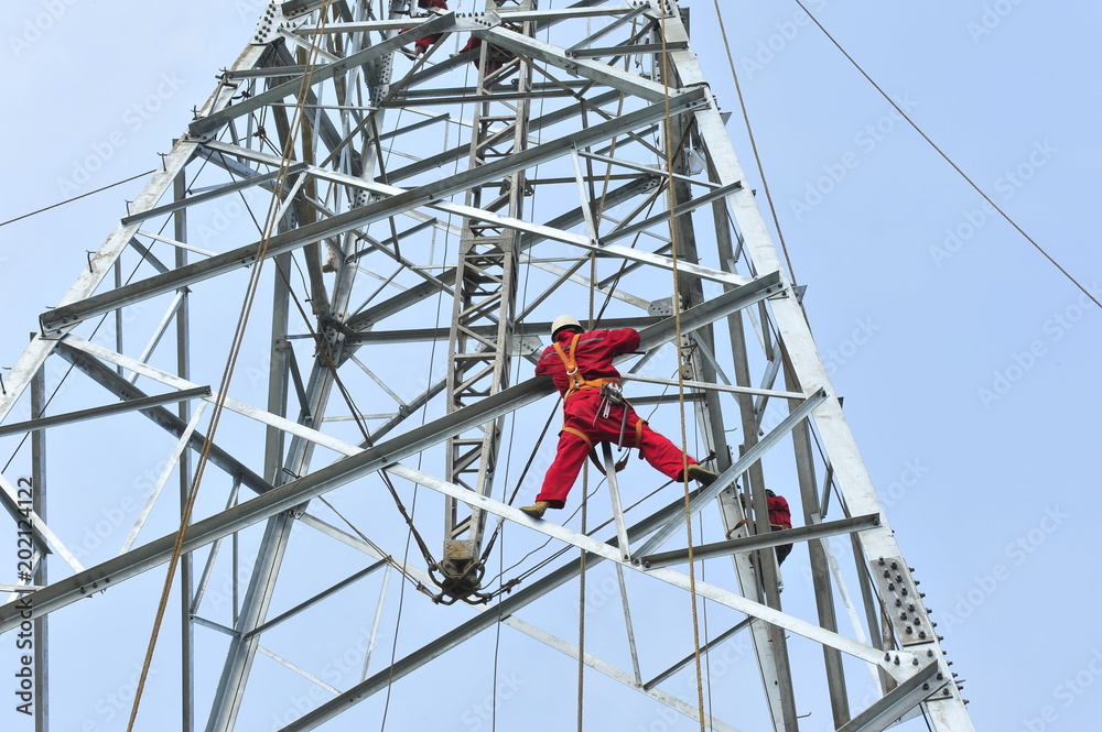 Fototapeta premium Pylon construction workers