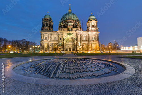 The illuminated Berlin Cathedral early in the morning
