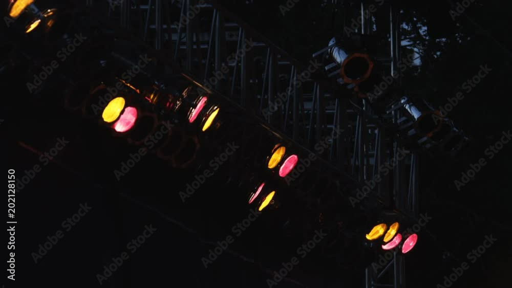 Colored stage lights going on and off Stock Video Adobe Stock