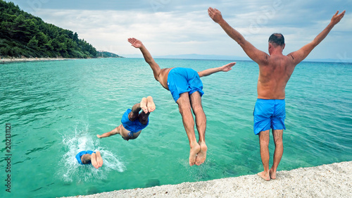 Attractive man jumping into water, image sequence