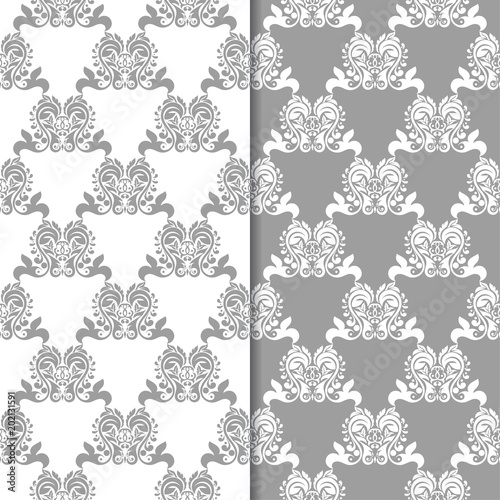 Fototapeta Naklejka Na Ścianę i Meble -  White and gray floral backgrounds. Set of seamless patterns
