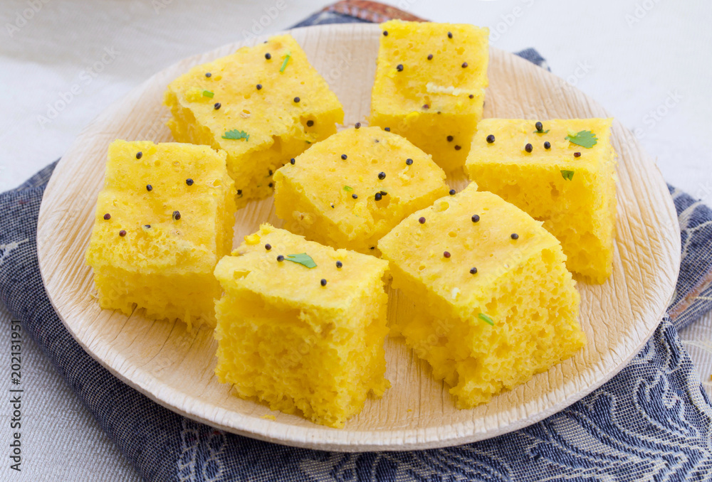 Indian Traditional Street Food Khaman Dhokla Served With Chutney & Chilli