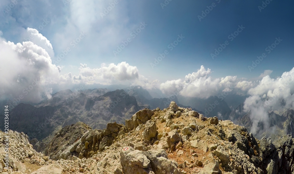 Mountaineer pov to expedition climbing to rocky mountain summit Triglav on Julian Alps mountain range