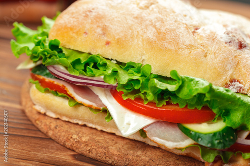 sandwich on a wooden table